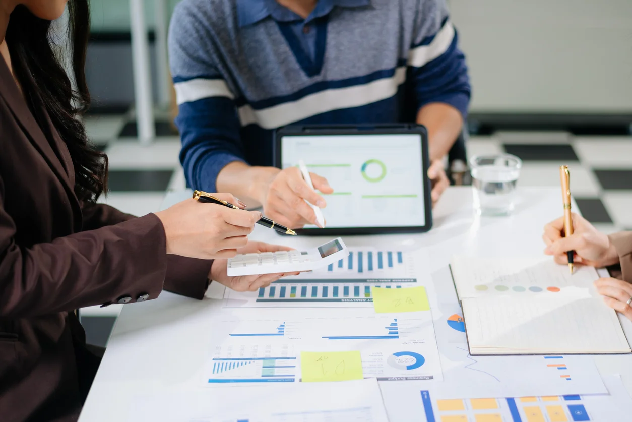 team analyzing financial statement 