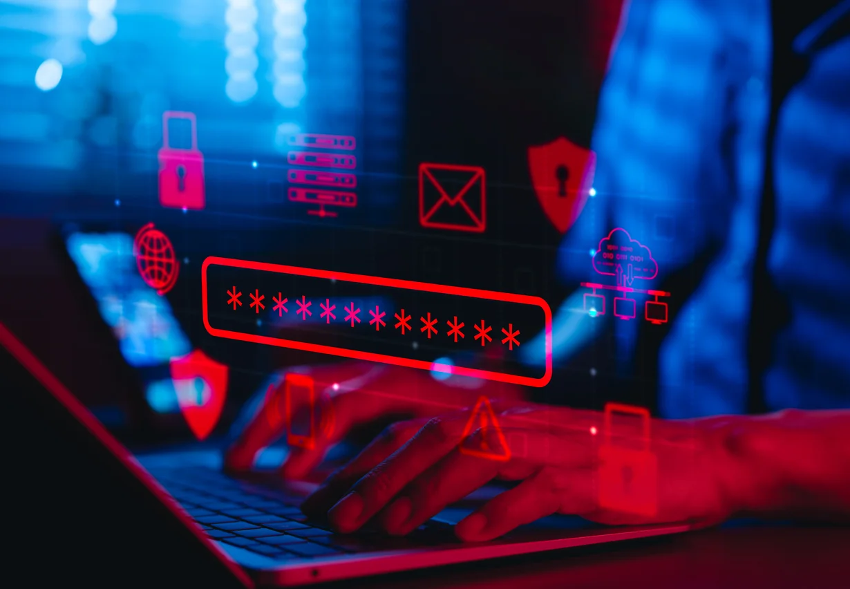 Laptop with red icons and hidden password field