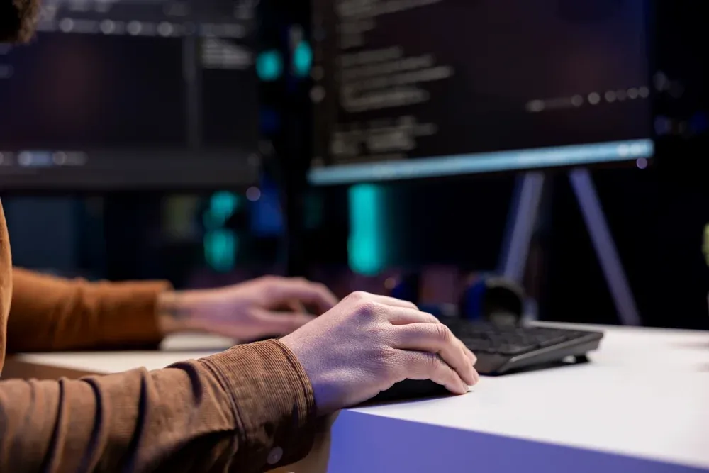 Person working at a computer.